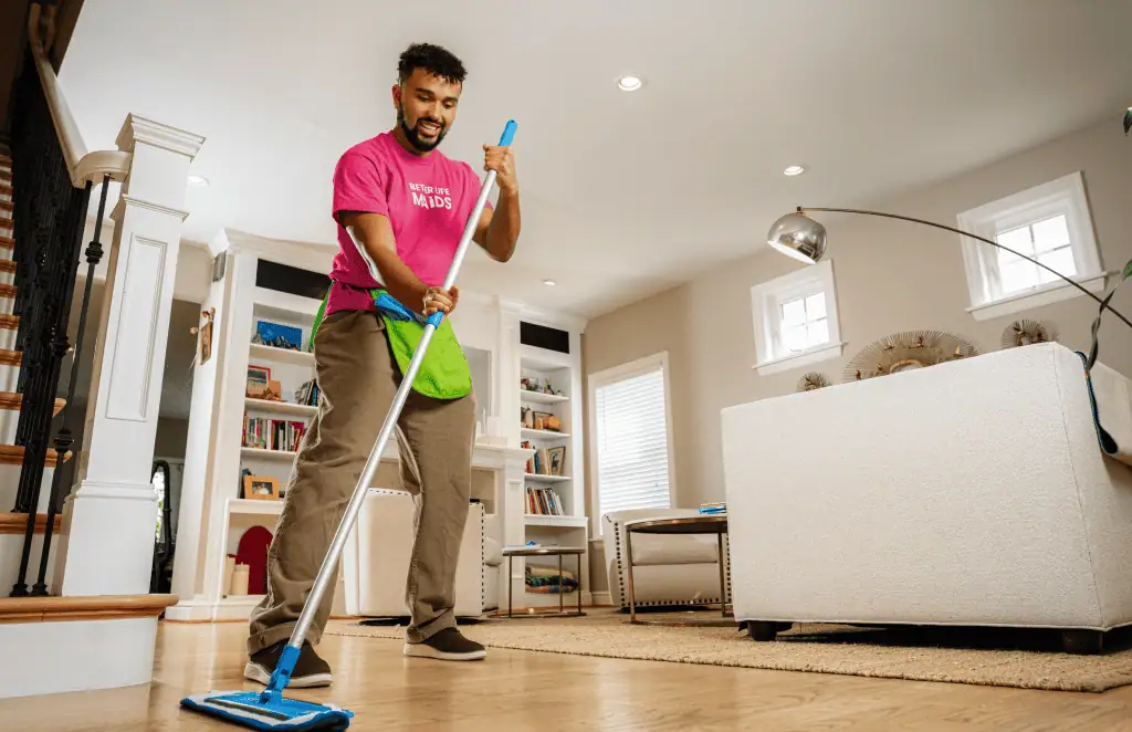 Cleaning technician cleaning floor