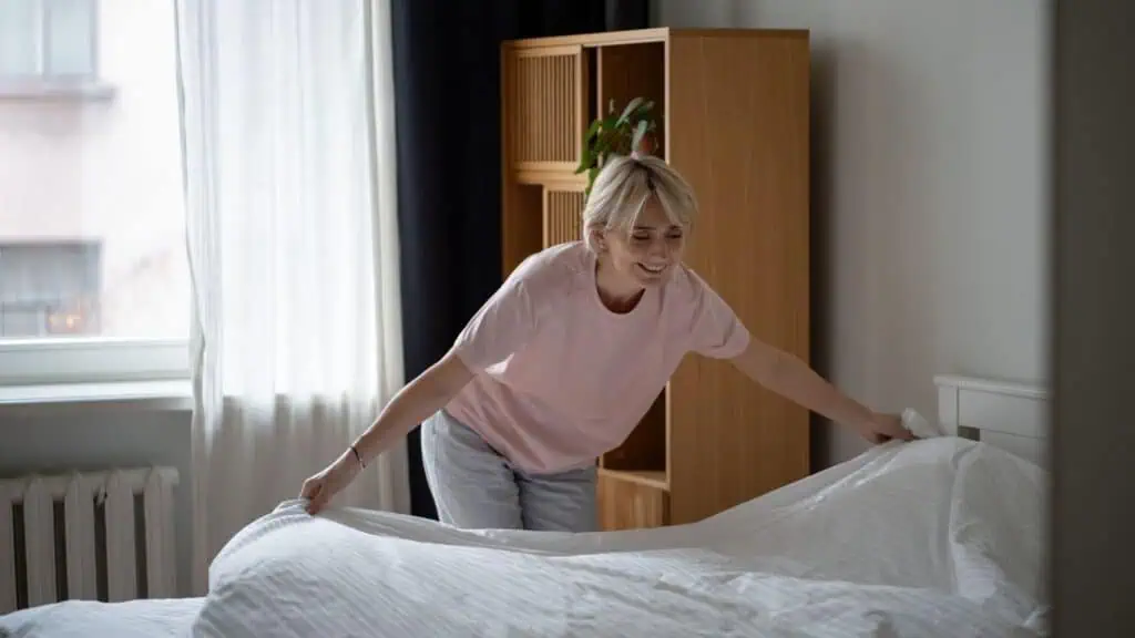 Person doing a quick home reset cleaning routine